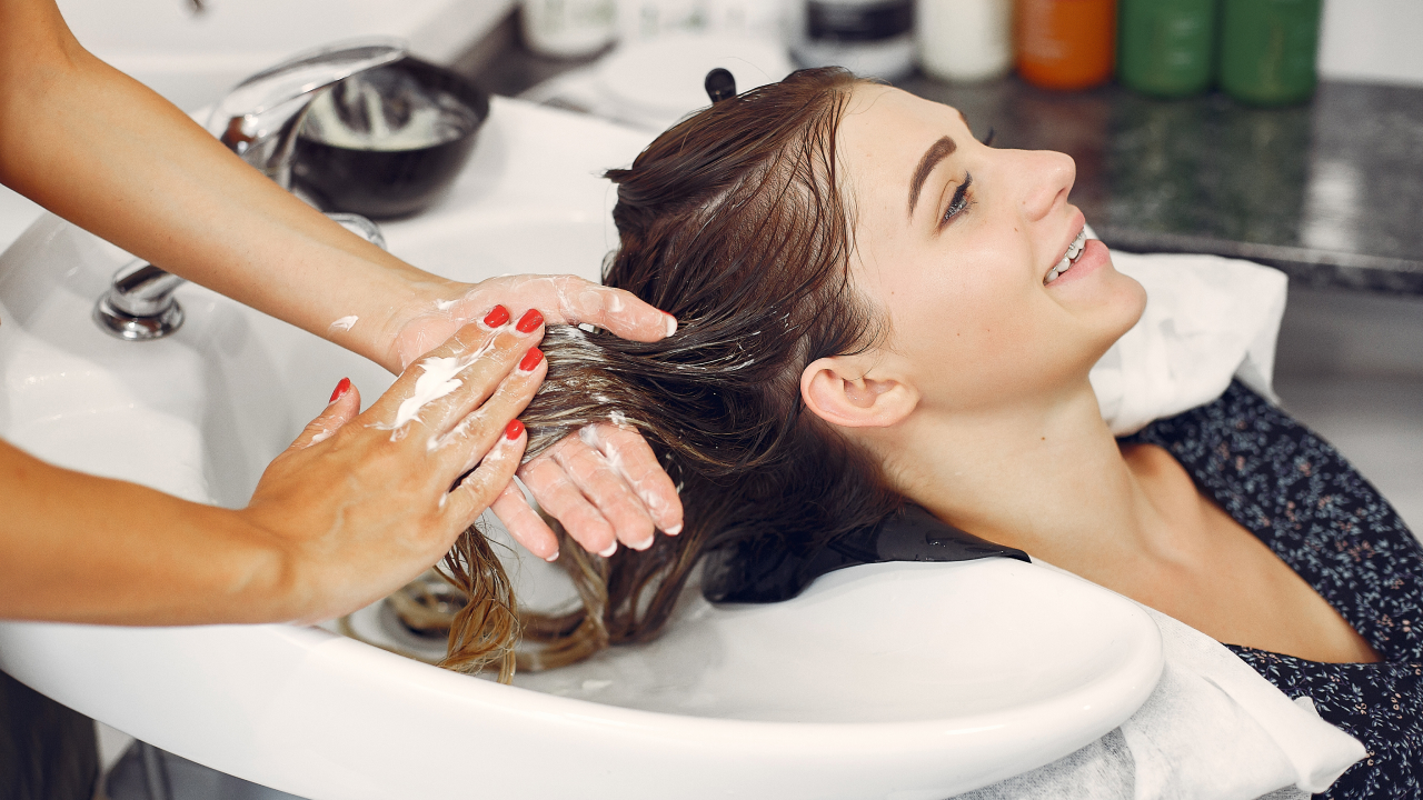 women washing hair in a salon