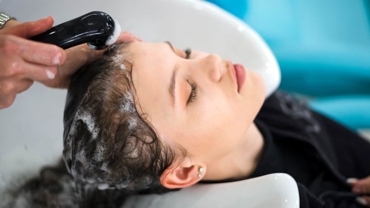 women getting their hair washed